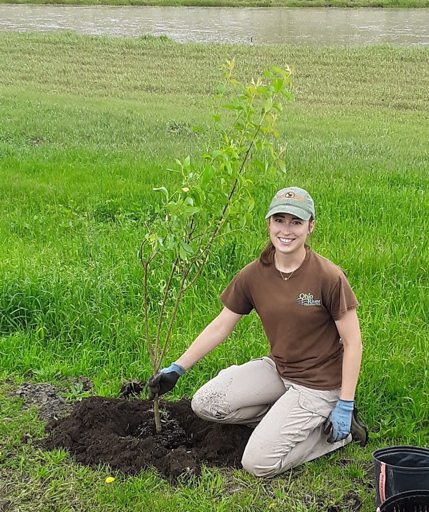 ORF Employee planting a tree